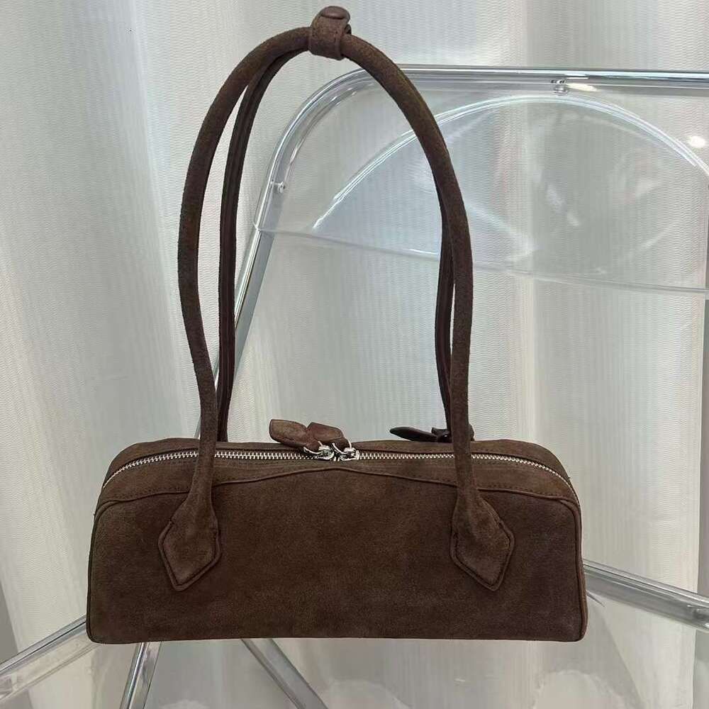 Ins Super Fire Sausage Fashionable And Niche Design High End Feeling French Stick Underarm Genuine Leather Shoulder Bag