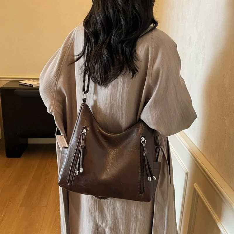 Womens Trendy Leather Crossbody Bag Featuring Paris Designer Style And Adjustable Strap Perfect For Daily UseW251111