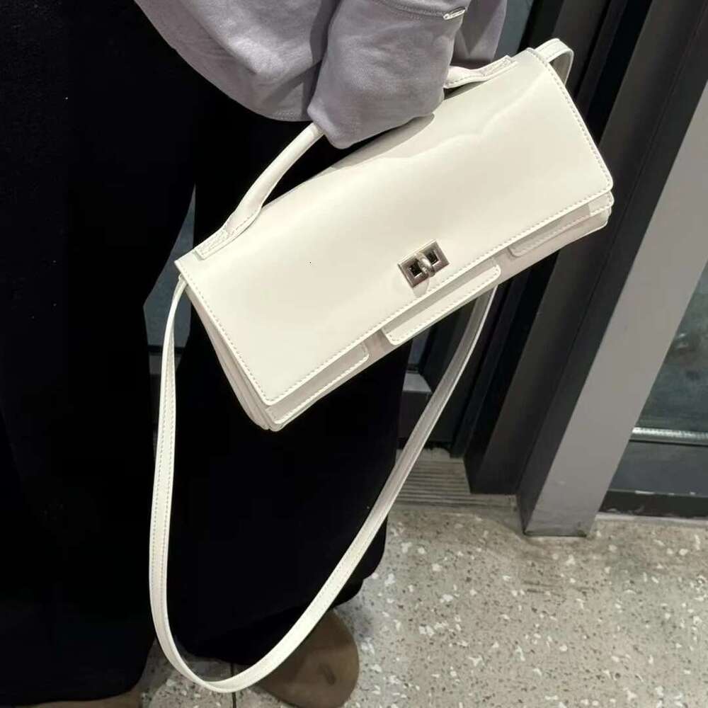 genuine leather handbag 2025 new niche design lock small square vintage motorcycle style cowhide oneshoulder crossbody bag