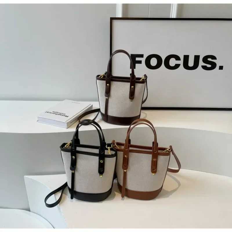 2025 Fi Versatile PU canvas bucket shoulder and cross body bag simple casual womens luxury handbagXJ250412