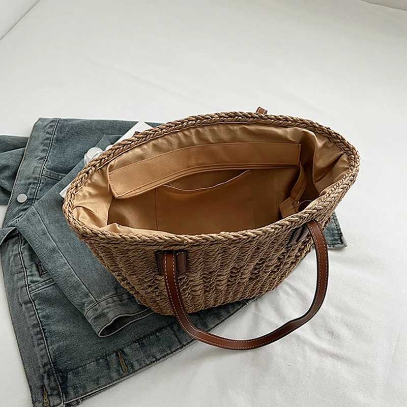 Summer womens Str shoulder bag Rattan womens top handbag hollow Raffia het beach bag casual handbagXJ250412
