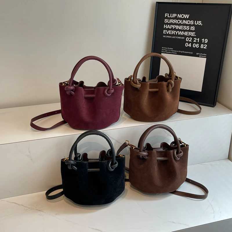 Frosted leather folding handheld bucket bag 2024 new fashionable Fi shoulder bag Versatile cross body bagXJ250412