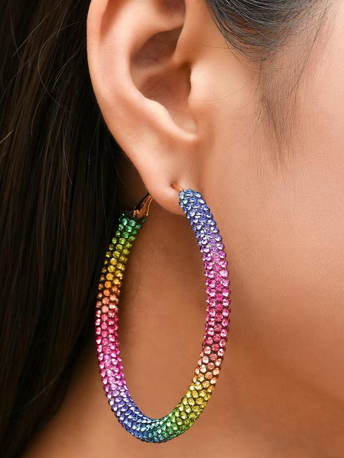 Ladies' earrings with rainbow colored rhinestones and large circular earrings