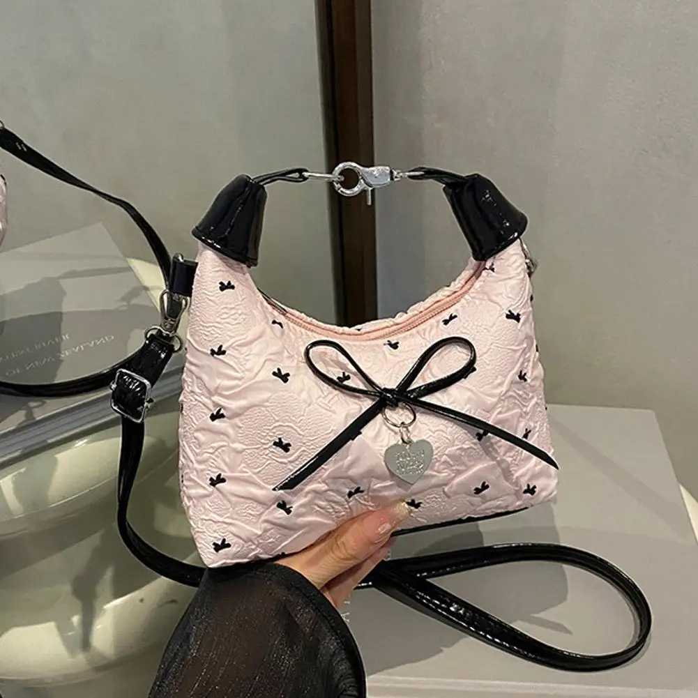 Bow Crossbody bag for women Sweet Fashion Print Metal heart Pendant Hand-held Single shoulder bag Commute Handbag Underarm pouchT2511112