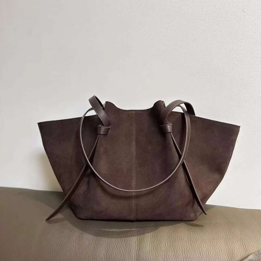 2024 Niche Design Wing Matte Cowhide Large Capacity Handheld Tote Suede Autumn And Winter Women's Shoulder Bag