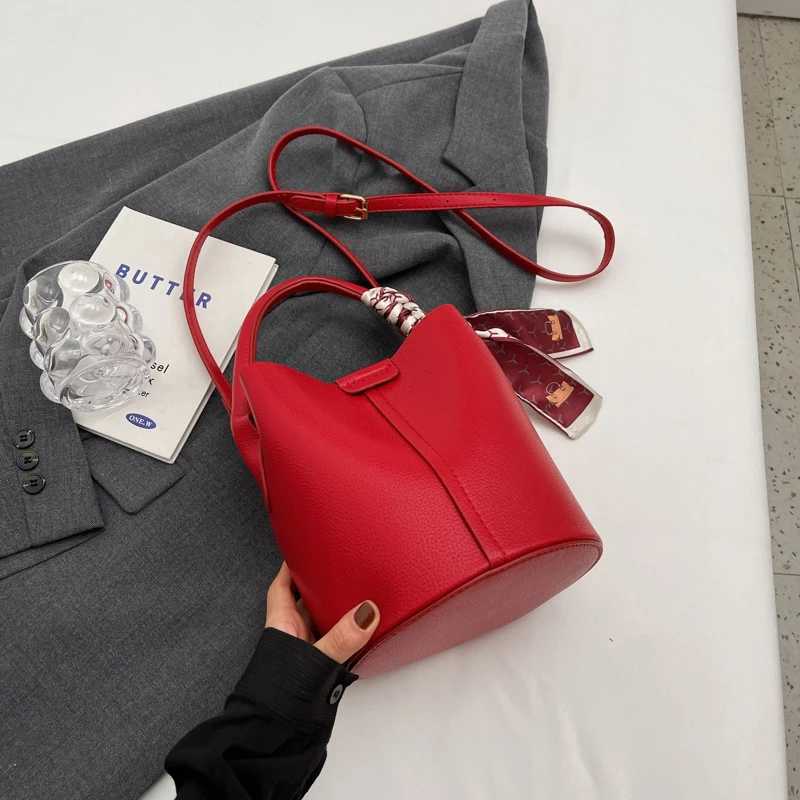 Fashionable summer tree shadow texture soft womens leather bucket bag for beginners holding one shoulder cross body bagXJ250412