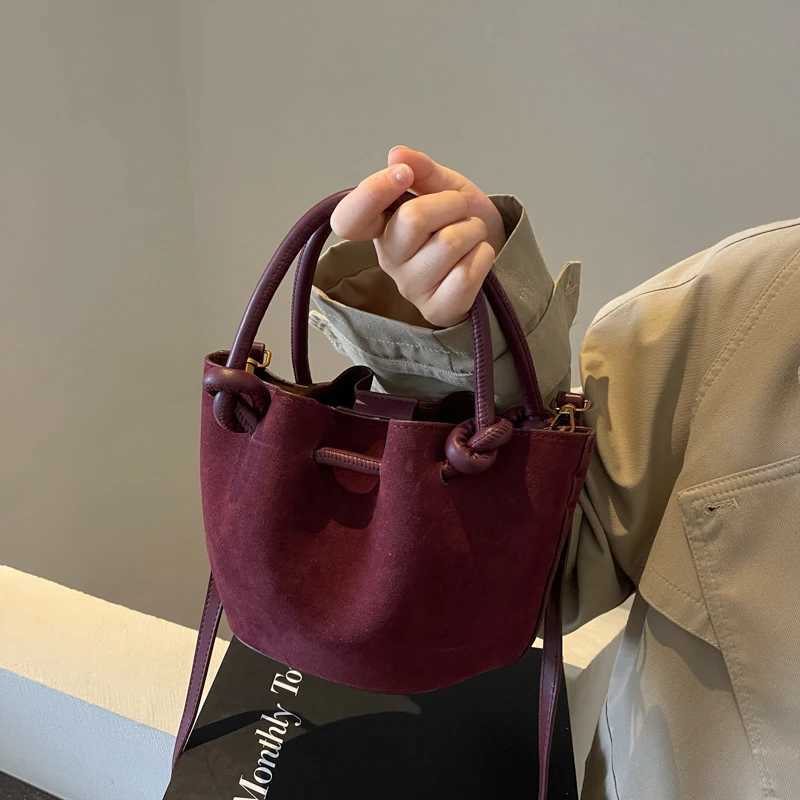 Frosted leather folding handheld bucket bag 2024 new fashionable Fi shoulder bag Versatile cross body bagXJ250412