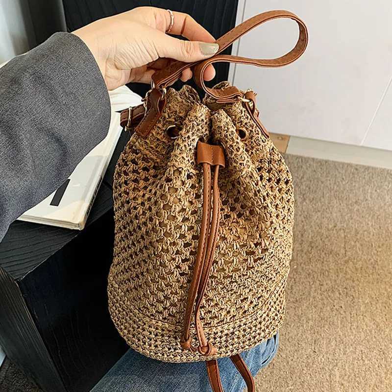 Knitted Bag Womens 2024 New Fi Bucket Bag Summer Niche 100 Str Beach Single Shoulder Cross BagXJ250412