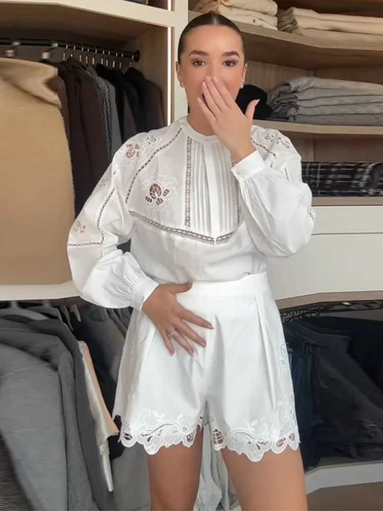 Fashion womens long sleeved embroidered top lace loose shorts set elegant hollow shorts set 2025 summer new womens 2-piece setXJ250411