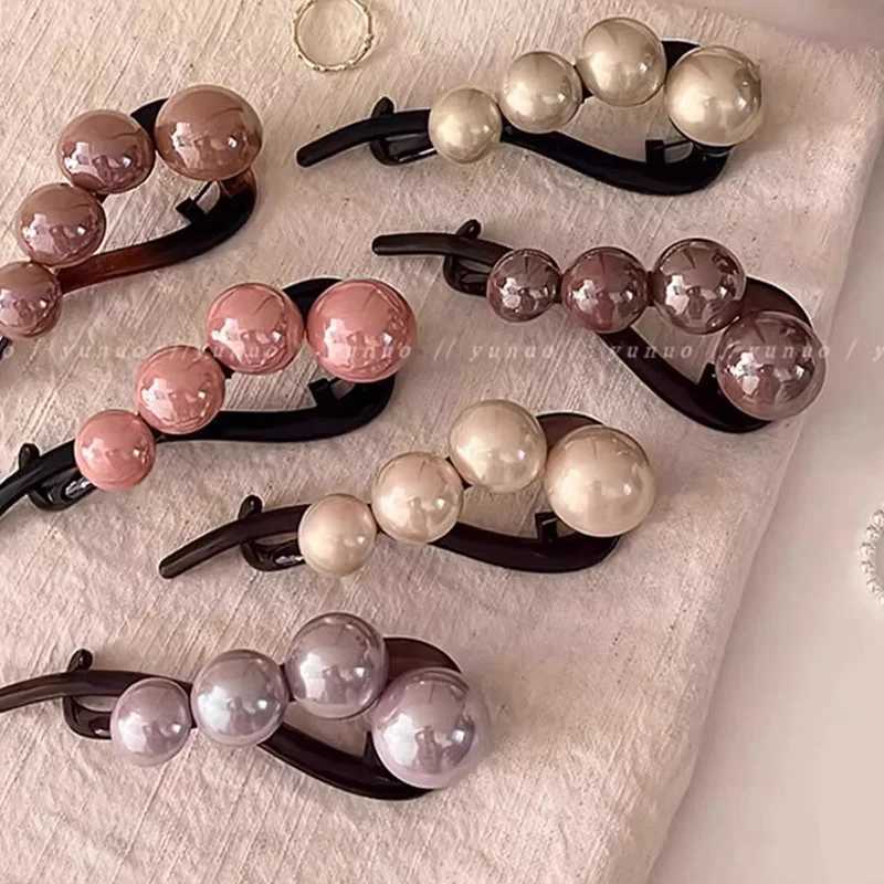 Elegant pearl twisted hair clip suitable for womens long hair racks hair clips barrel shaped sweet hair headbands fashionable hair accessories Y250401