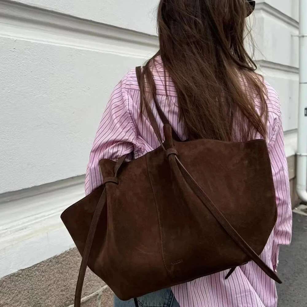 2024 Niche Design Wing Matte Cowhide Large Capacity Handheld Tote Suede Autumn And Winter Women's Shoulder Bag