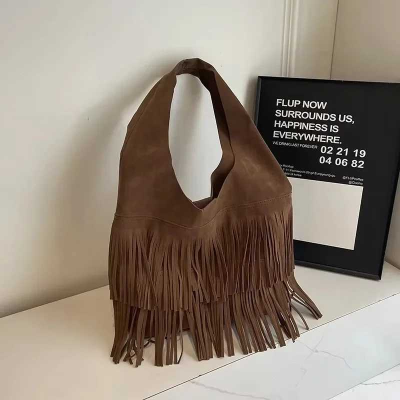 High end minimalist handbag 2025 autumn/winter foldable tassel single shoulder womens large capacity frosted bucket bagXJ250412