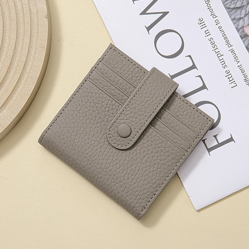 Genuine leather womens RFID blocking ultra-thin mini short wallet womens double fold wallet with 9 card slots and 1 coin pocket 250411