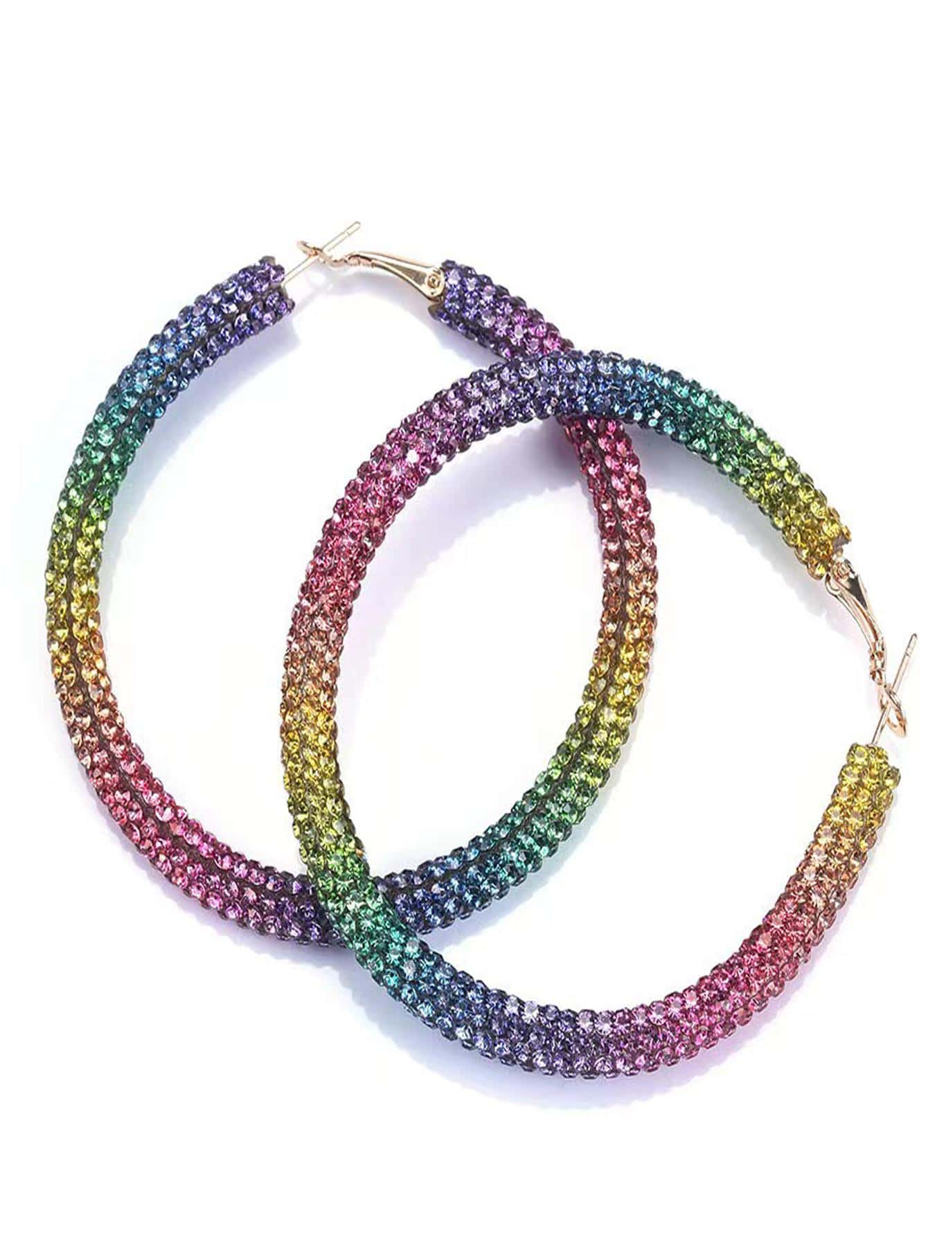 Ladies' earrings with rainbow colored rhinestones and large circular earrings
