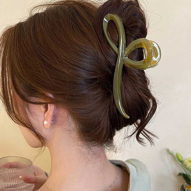 Elegant jelly colored bow hair claws suitable for women sweet hair decoration hair clip at the back fashionable hair accessories Y2504012