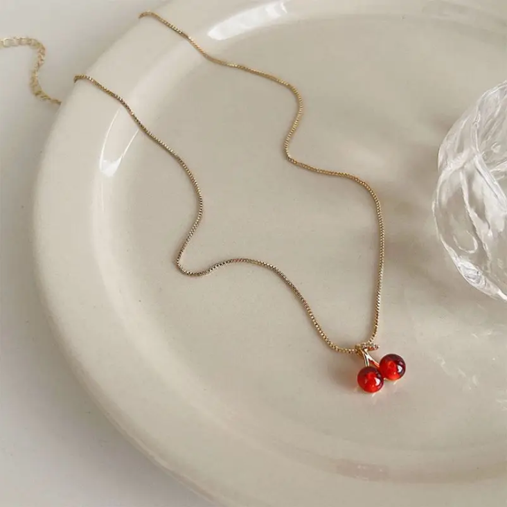 Two piece cherry themed jewelry set for women, including necklace and earrings