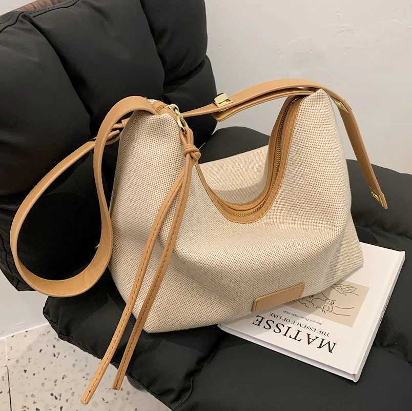 Fashionable and casual soft ordinary womens bag Oxford cloth shoulder foreskin leather shoulder strap handbag womens luxury bagXJ250412