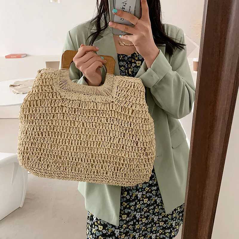 Summer woven Str handbag womens wooden handbag large capacity travel beach bag Fi style handbag hollow handbag BolsaXJ250412