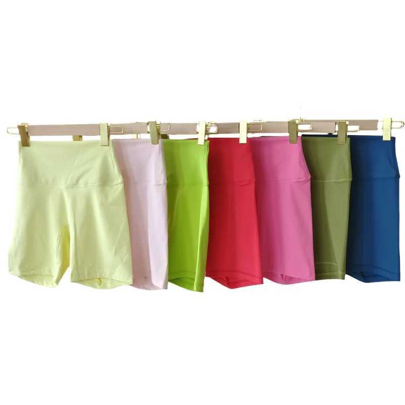 Solid color womens fitness exercise short waist yoga short cycle comprehensive training jogging squatting anti lock inner bag Y250412