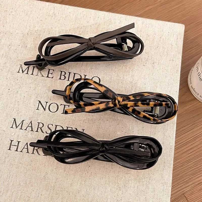 New twisted hair clip PU bow bucket large-sized hair clip plastic hair clip sweet daily headband female hair accessories Y2504012