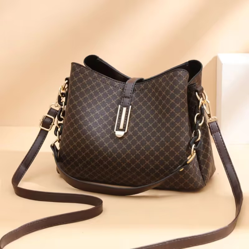 Quality New Leather Handbags High Capacity Advanced Sense Female Long Strap Shoulder Bag