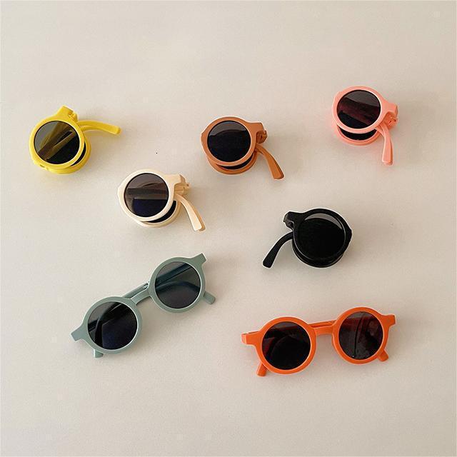 New cute baby one year old posing glasses, UV resistant and sunscreen sunglasses, children's round frame folding sunglasses