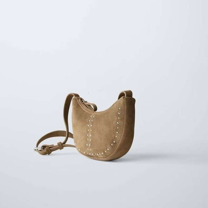 Women's 2025 Spring/Summer New Item Niche Design Rivet Decoration Daily Matching Casual Bag