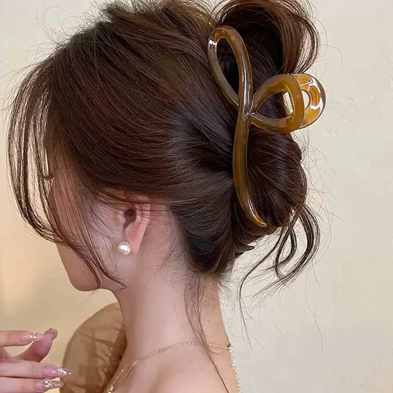 Elegant jelly colored bow hair claws suitable for women sweet hair decoration hair clip at the back fashionable hair accessories Y2504012