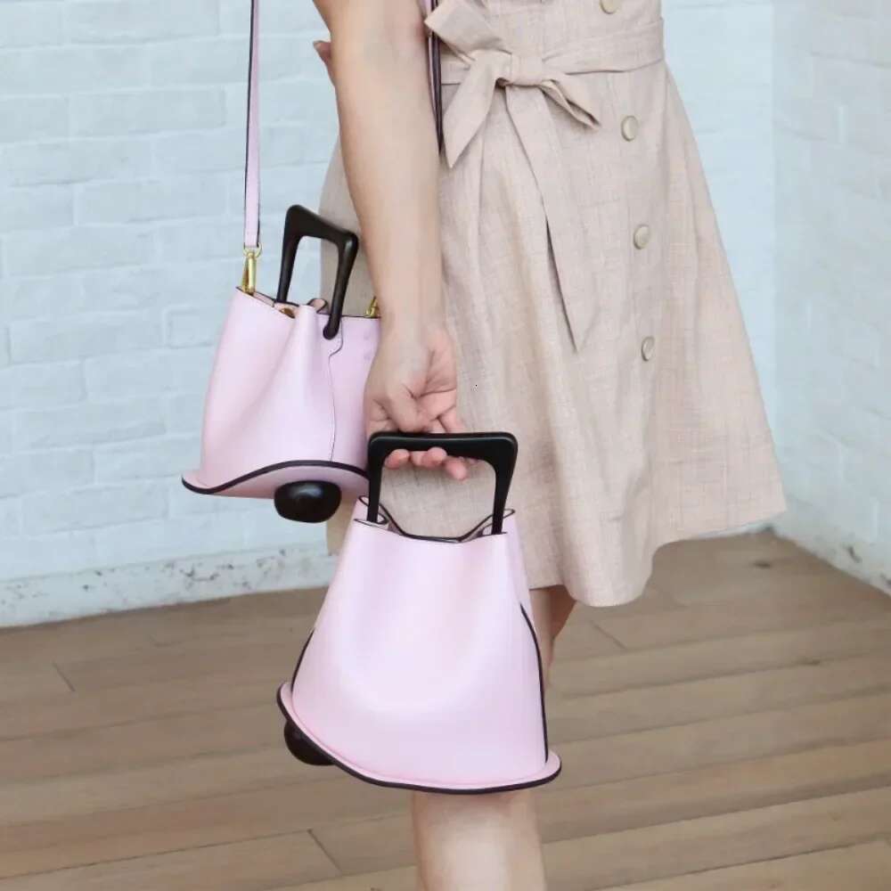 New Cowhide Genuine Leather Minority Korea Handbags Commuter Women Simple All-Match Bucket Large Capacity Advanced Shoulder Bag