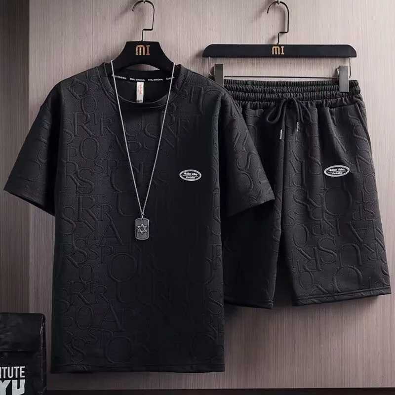 Mens set 2024 new waffle biscuit summer casual T-shirt+shorts set basketball track suit letter printed solid color loose setXJ250412