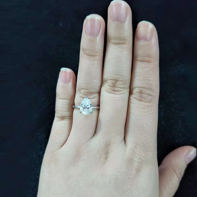 Starsgem D VVS 6.5*9.5mm Pear Crushed Ice Cut Moissanite in 14k Gold Ring