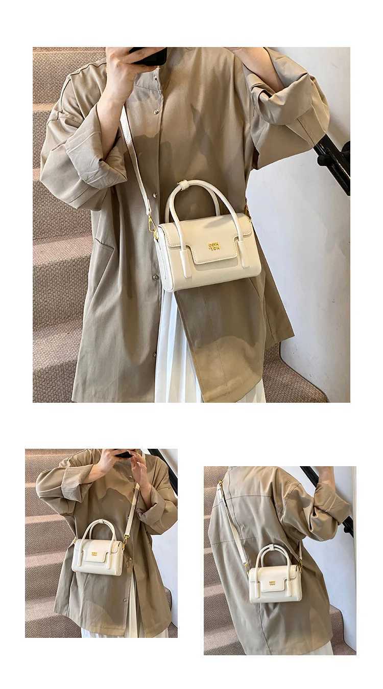 Luxury designer lock oil PU leather womens handbag cross body bag flip cover handbagXJ250412