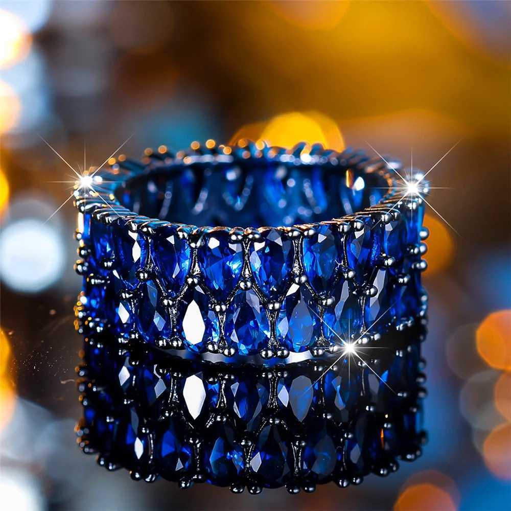 Luxury Womens Crystal Purple Blue Zircon Engagement Ring Vintage Black Gold Colored Waterdrop Womens Wedding JewelryXJ250412