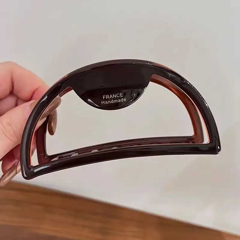 One European and American hair ornament hollow acetic acid handle big meat ball hair claw Y2504012