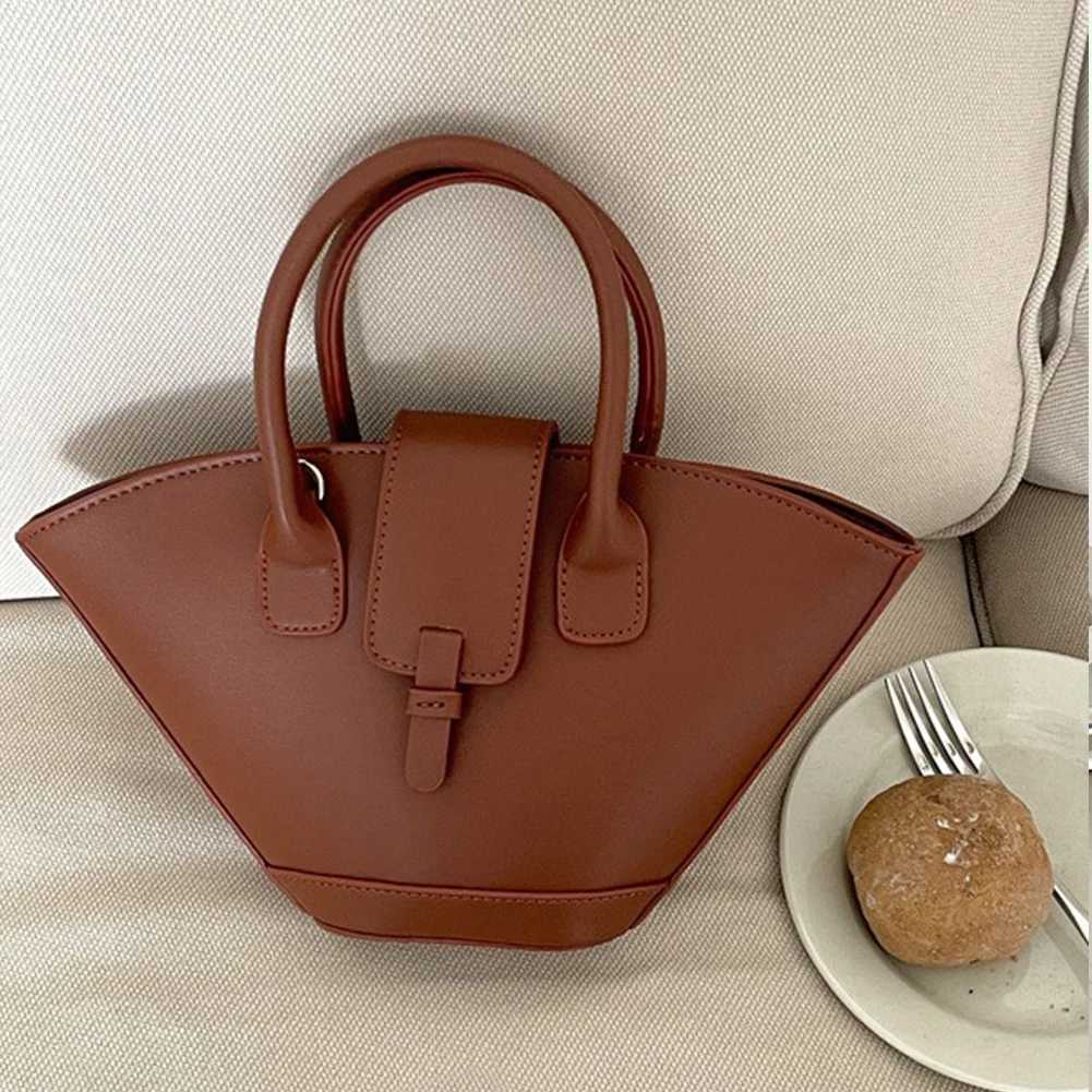 Luxury designer shoulder bag large capacity Fi handbag trapezoidal fashion cross shaped bag fan-shaped bucket bagXJ250412