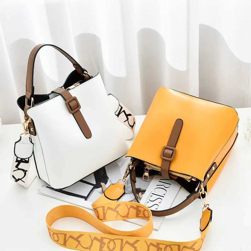 Elegant womens bucket bag with detachable wide shoulder straps sturdy solid color cross body shoulder bagXJ250412