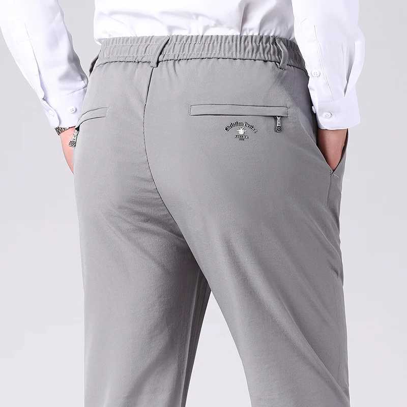 Mens elastic waist pants elastic casual pants plus size Trouser sportswear running and jogging pants 5XL W250411
