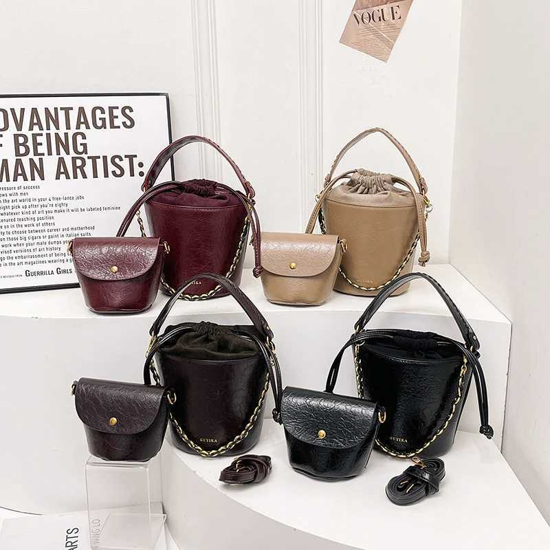 MOODS bucket cross body bag womens oil waxed leather 2-in-1 chain shoulder bag 2024 luxury designer wallet and handbagXJ250412
