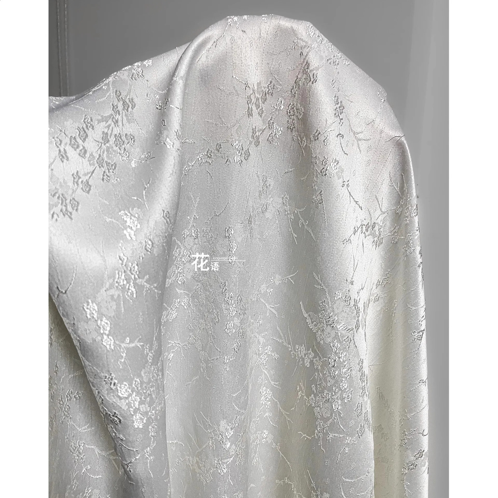 White plum blossom twigs dark pattern jacquard fabric three-dimensional relief Chinese cheongsam suit er fabric 250407
