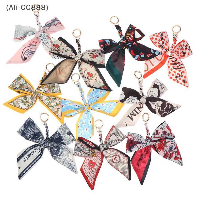 CC88Camellia Silk Scarf Bowknot Keychain Pendant Fresh Womens Bag Decor Ribbon Bow Romantic Bag Charm Fashion AccessoriesW251112
