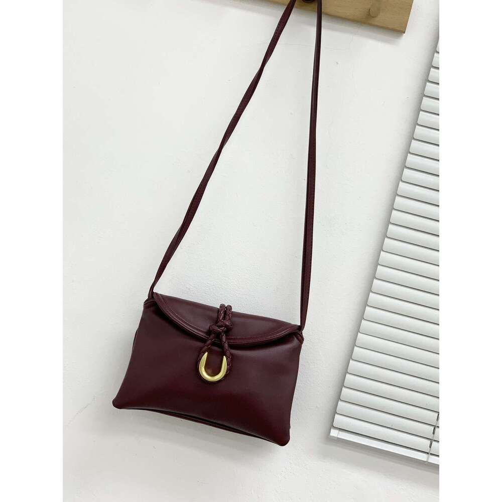 24 New Vegetable Tanned Cowhide Woven Rope Buckle Single Shoulder Crossbody Bag, High-End Texture Women's Hand-Held Armpit Bag