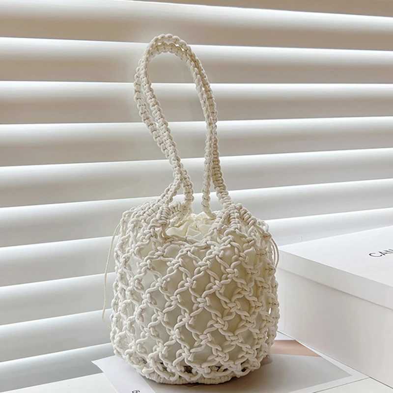 Mini design Str womens bag new summer high-end handbag water bag hot selling woven beach cross body bagXJ250412