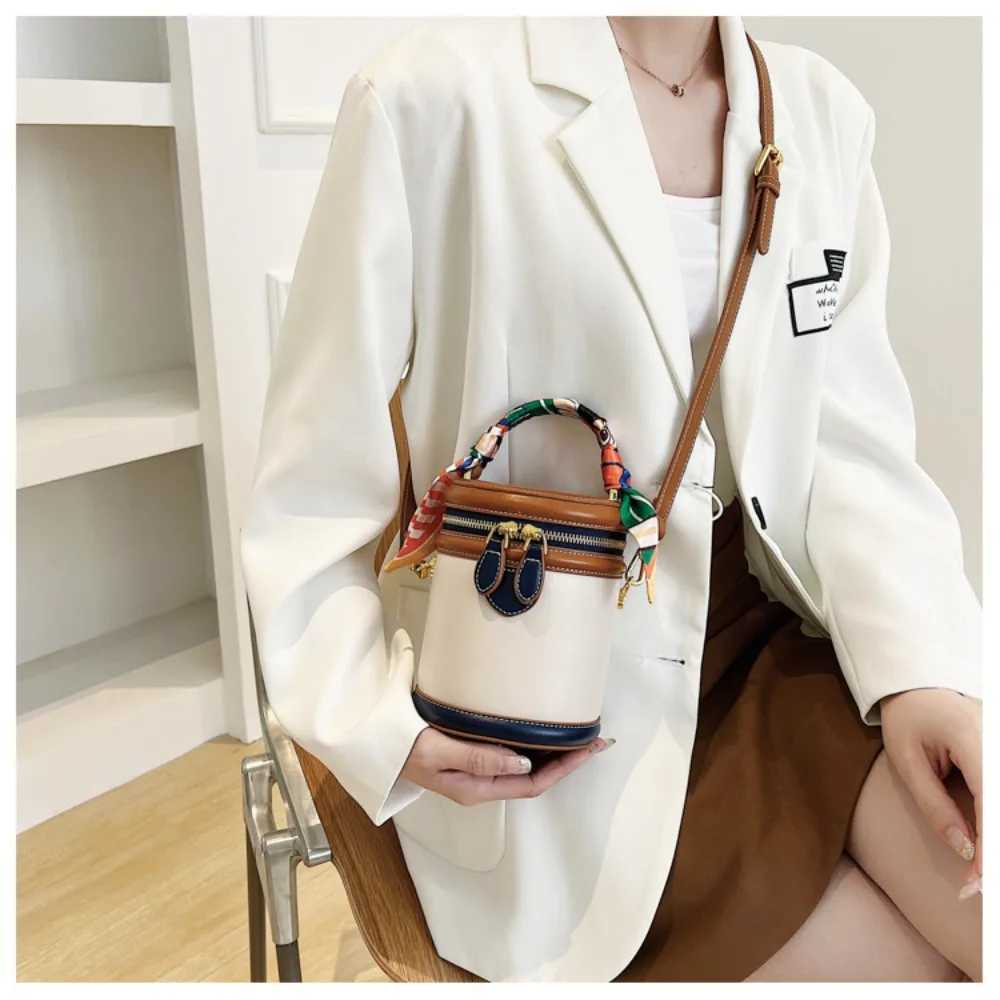 Exquisite PU leather bucket bag womens new cylindrical portable handbag large capacity shoulder cross bag travel shoppingXJ250412
