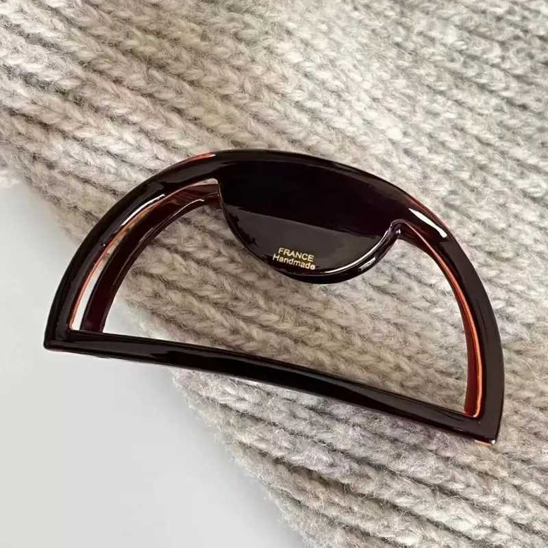 One European and American hair ornament hollow acetic acid handle big meat ball hair claw Y2504012