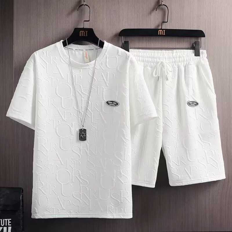 Mens set 2024 new waffle biscuit summer casual T-shirt+shorts set basketball track suit letter printed solid color loose setXJ250412