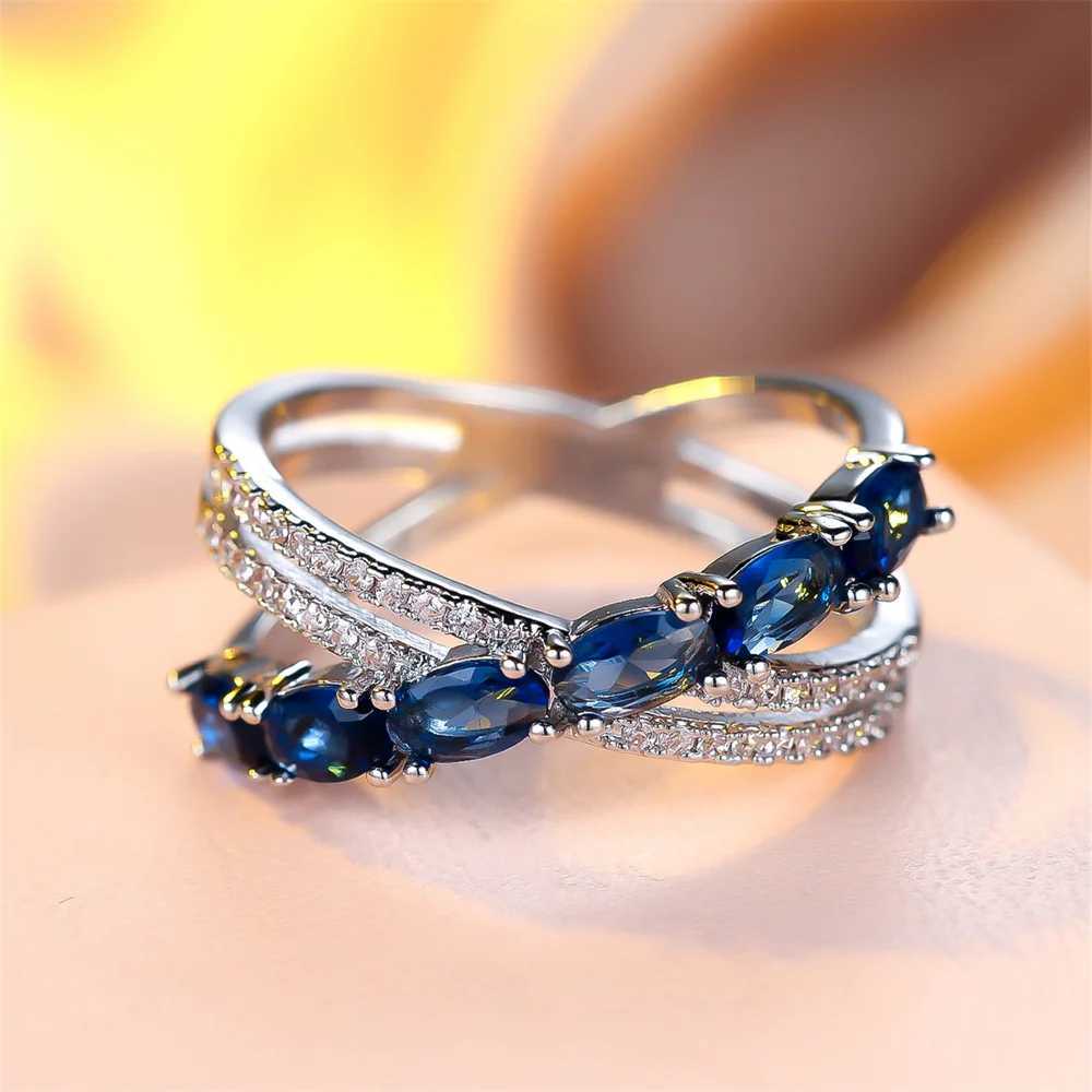 Blue crystal oval stone cross ring suitable for women Tren silver wedding band engagement jewelry simple and fashionable birthday giftXJ250412