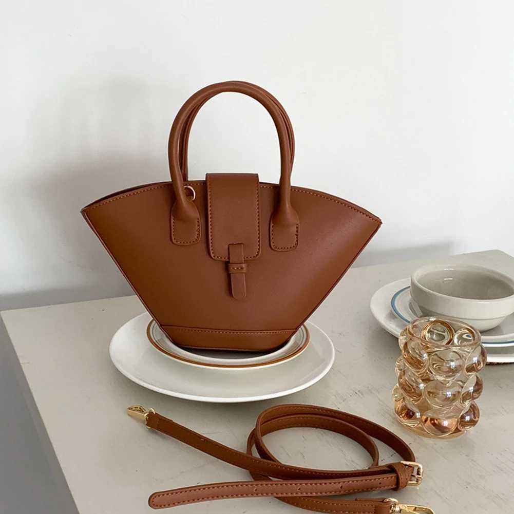 Luxury designer shoulder bag large capacity Fi handbag trapezoidal fashion cross shaped bag fan-shaped bucket bagXJ250412