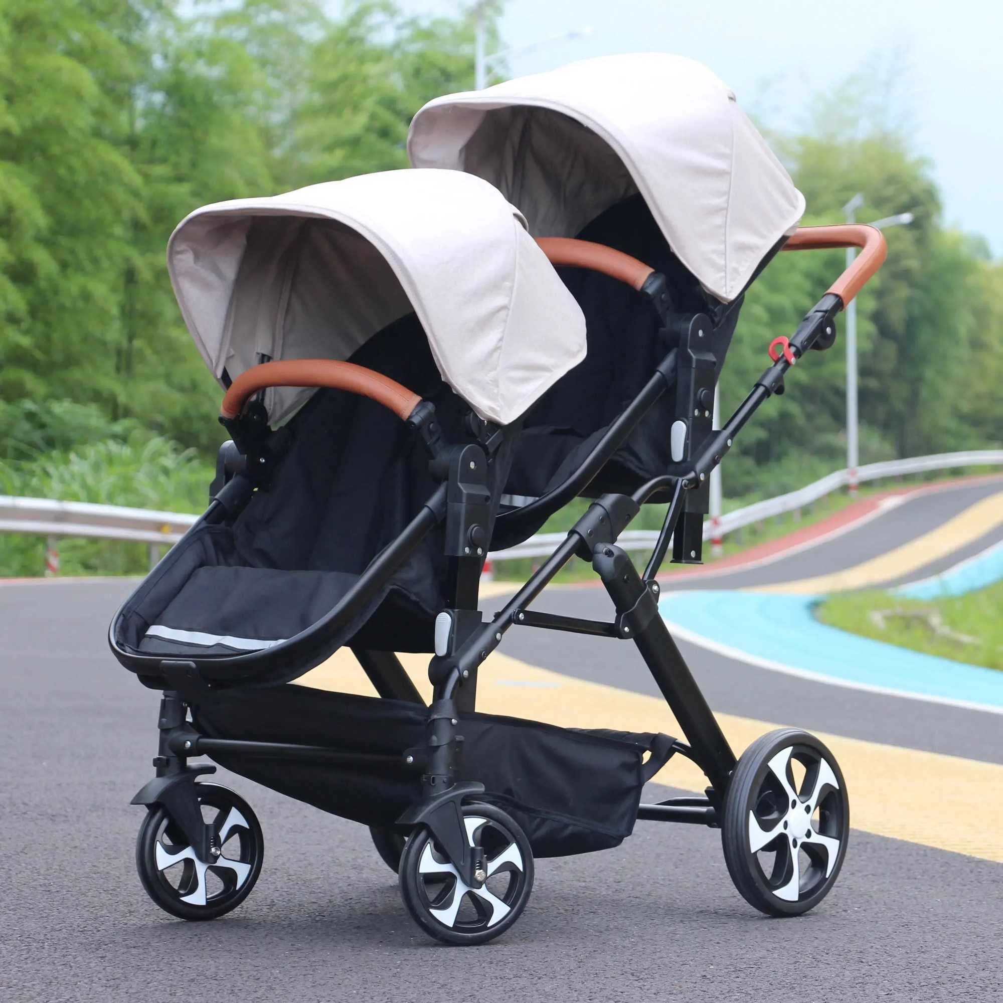 The new twin baby stroller can be folded lightweight and compact. It is a 2-in-1 sleep basket baby stroller and a twin baby stroller W250411