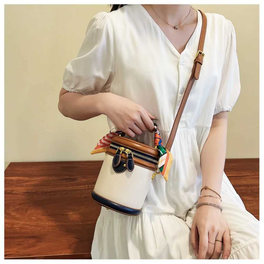 Exquisite PU leather bucket bag womens new cylindrical portable handbag large capacity shoulder cross bag travel shoppingXJ250412