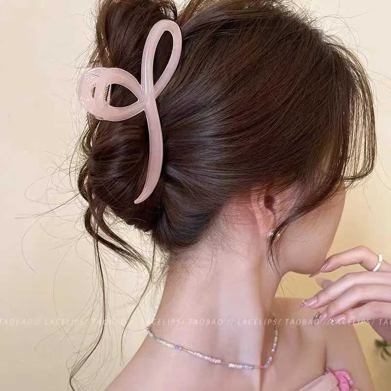 Elegant jelly colored bow hair claws suitable for women sweet hair decoration hair clip at the back fashionable hair accessories Y2504012